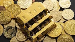 Gold prices reach record high in India amid global cues